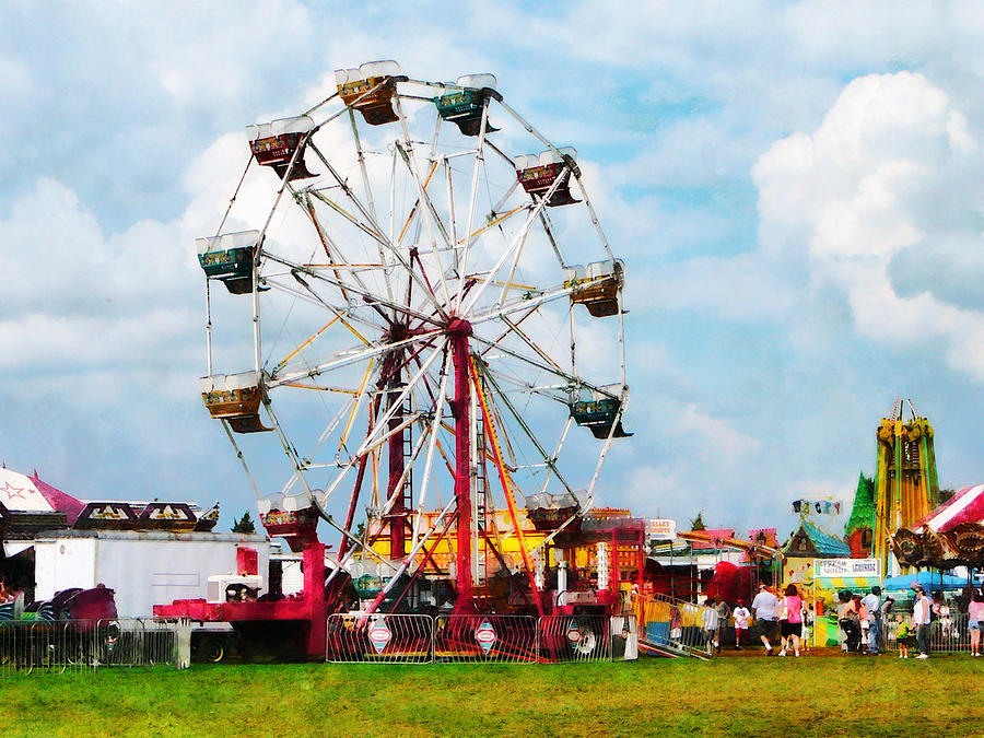 Ferris Wheel Against Blue Sky Photograph by Susan Savad