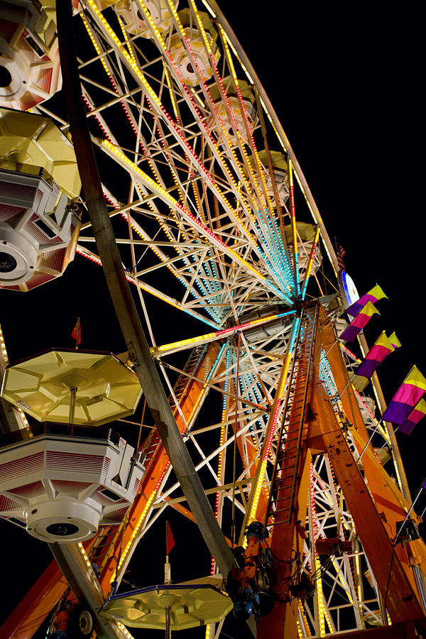 Ferris wheel Photograph by Alexey Stiop
