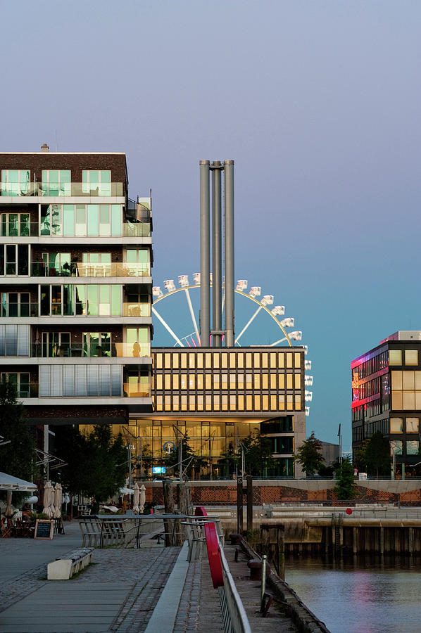 Ferris Wheel And New Buildings Photograph by Thomas Winz