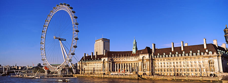Ferris Wheel With Buildings Photograph by Panoramic Images