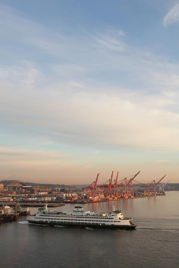 Ferry Docking Near Port Of Seattle Photograph by John & Lisa Merrill