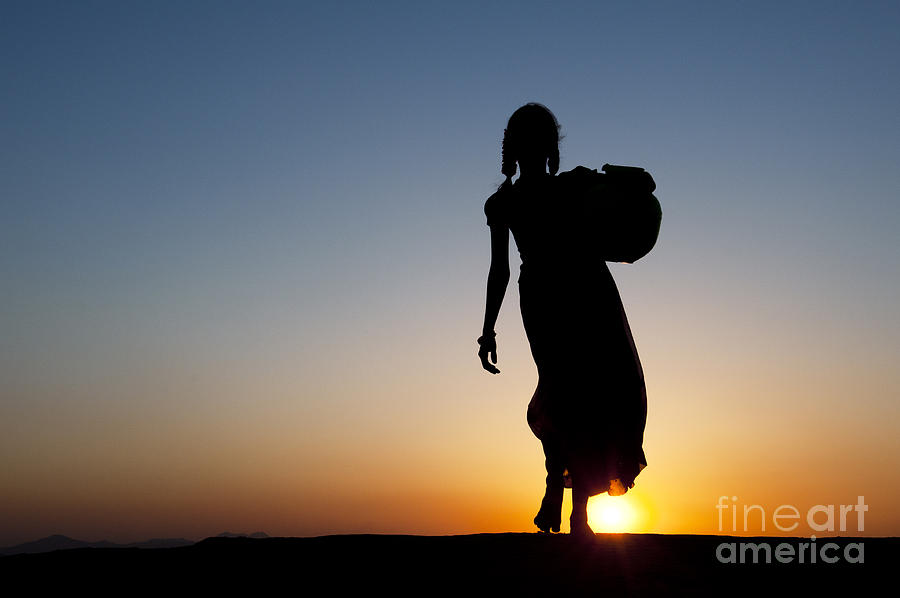 Sunset Photograph - Fetching Water by Tim Gainey