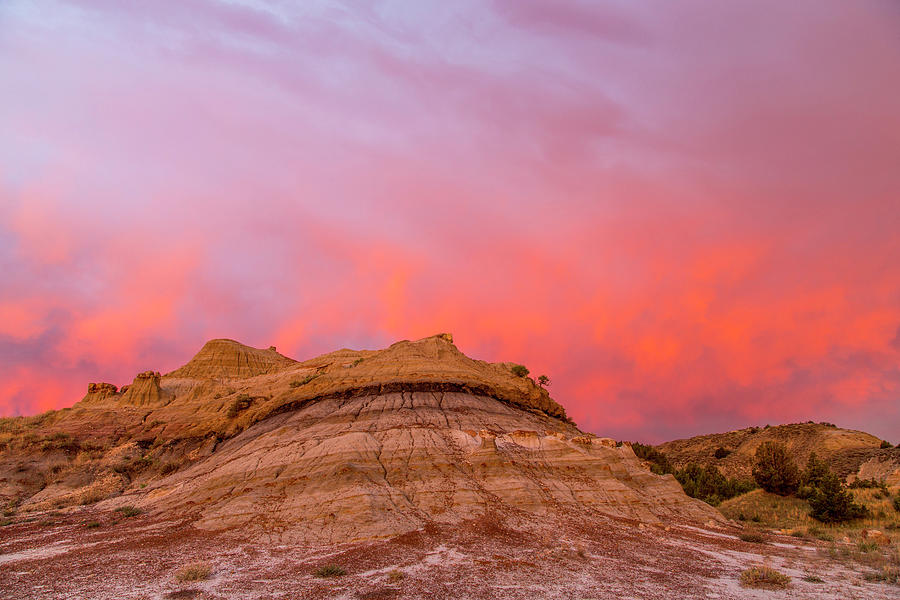 Theodore Roosevelt National Park Photograph - Fiery Sunrise Clouds Over Badlands by Chuck Haney