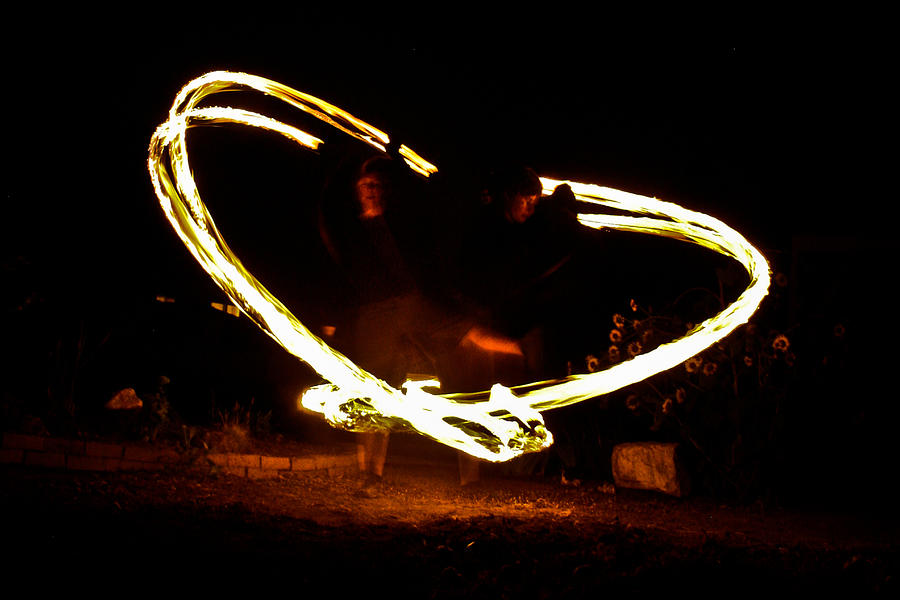 Fire Dancer Photograph by Joel Loftus