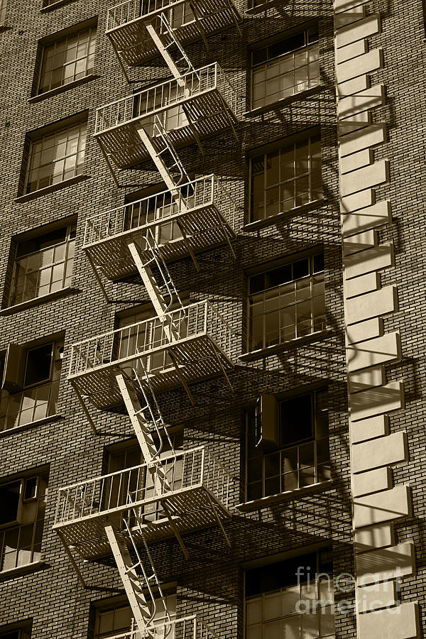 Fire Escape castinga Shadow on the Facade of a Building Architec Photograph by ELITE IMAGE photography By Chad McDermott