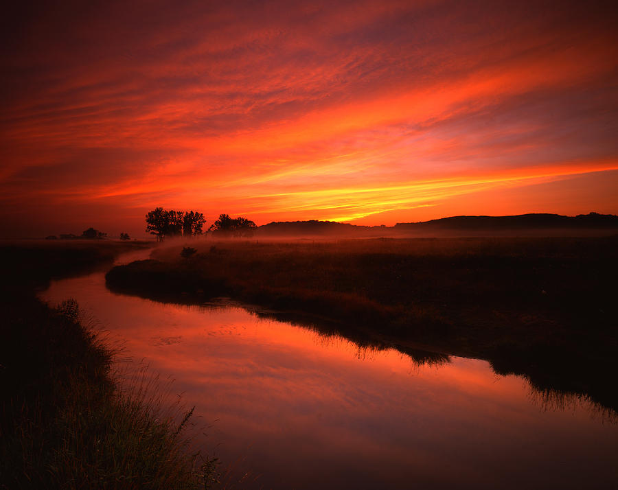 Fire in the Sky Photograph by Ray Mathis