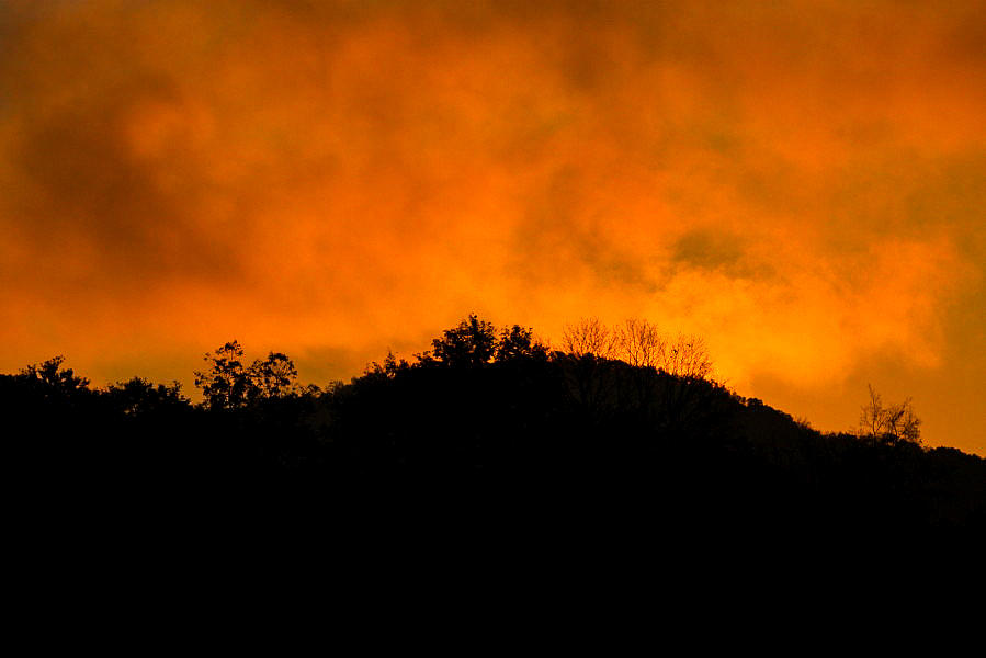 Fire in the Sky Photograph by Robert Hebert