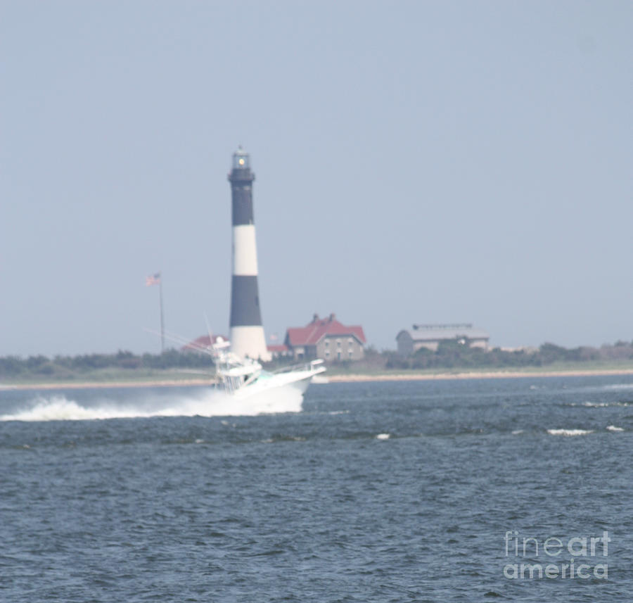 Fire Island Lighthouse With Boat Racing By #3 of 4 Photograph by John Telfer