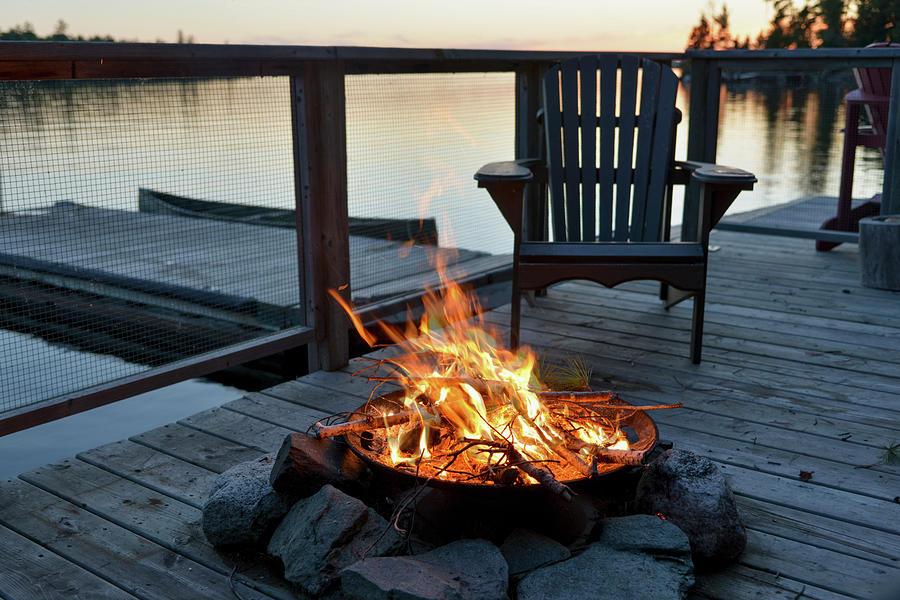 Fire Pit On A Wooden Dock On A Lake At Photograph by Keith Levit / Design Pics