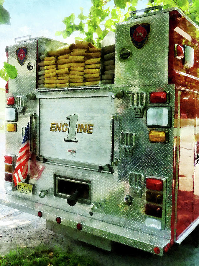 Fireman - Back of Fire Truck Closeup Photograph by Susan Savad