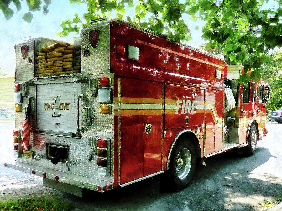 Fireman - Back of Fire Truck Photograph by Susan Savad