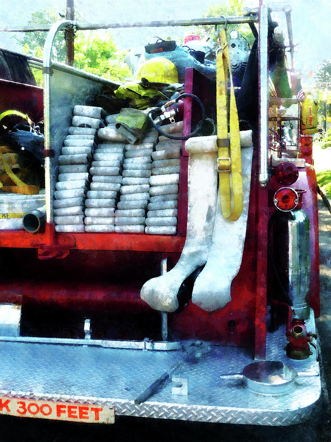 Fireman - Hoses on Fire Truck Photograph by Susan Savad