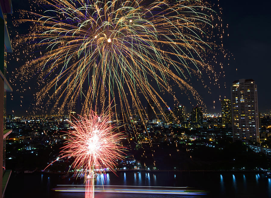 Fireworks over the Chao Phraya Photograph by Bob VonDrachek