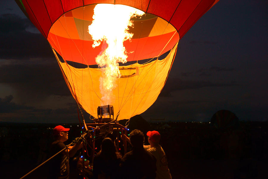Firing Up The Night at Balloon Fiesta Photograph by Daniel Woodrum