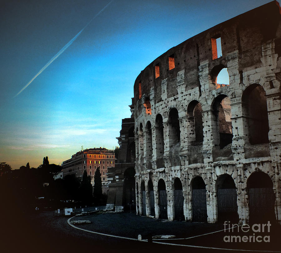 First Light at the Colosseum Photograph by Karen Lewis