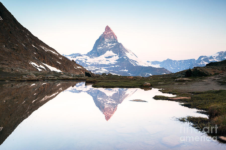 First light on the Matterhorn Photograph by Matteo Colombo