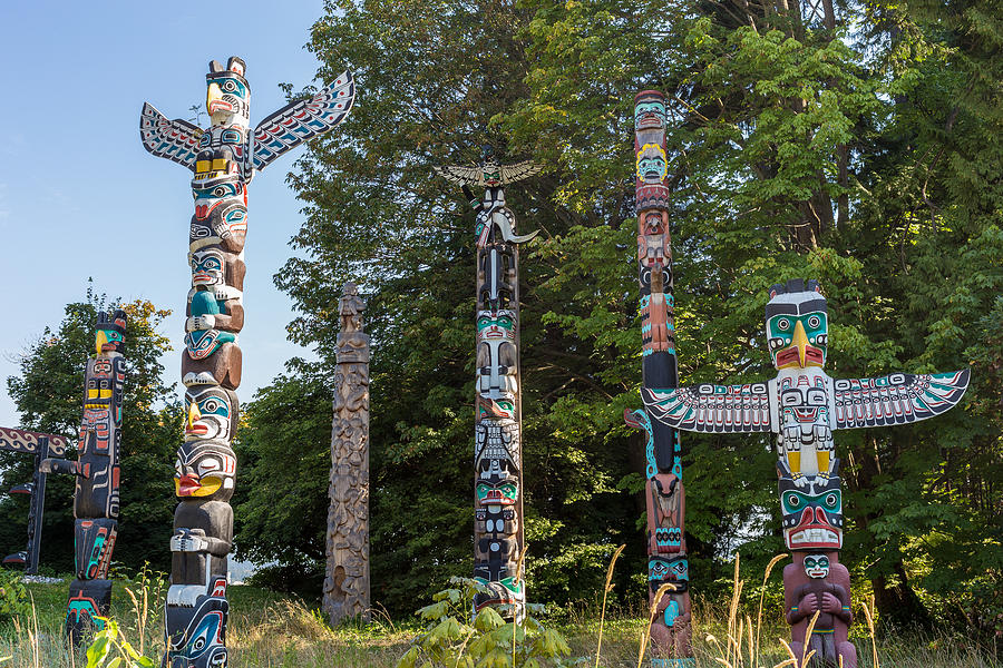 First Nations Totem poles, Stanley Park, Vancouver Photograph by Victor Cardoner