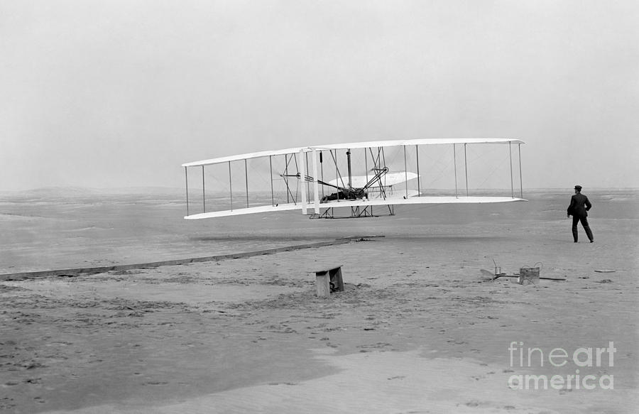 First successful flight of the Wright Flyer Photograph by Paul Fearn