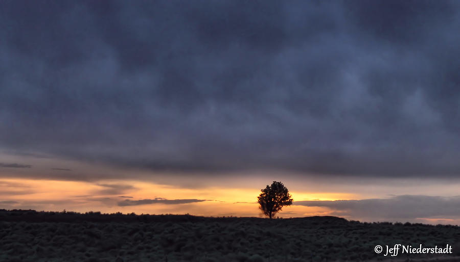 First sunset Photograph by Jeff Niederstadt