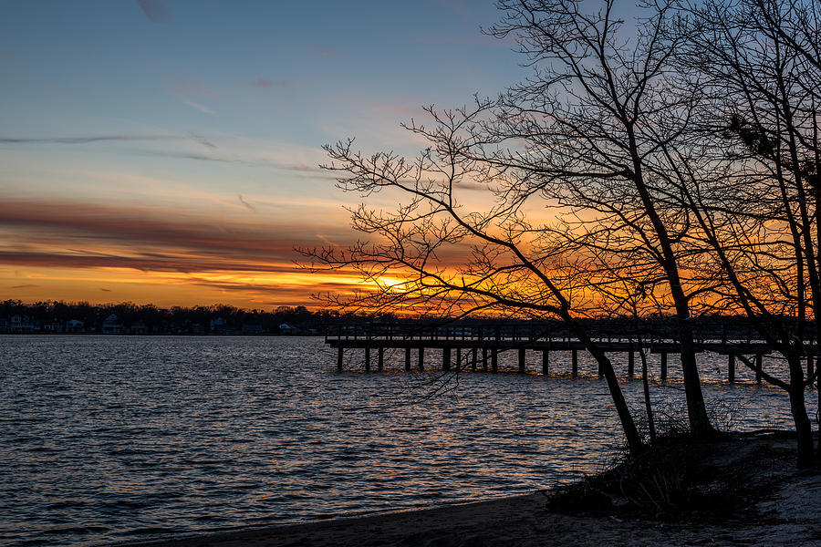 First Sunset of the New Year Photograph by Terry DeLuco