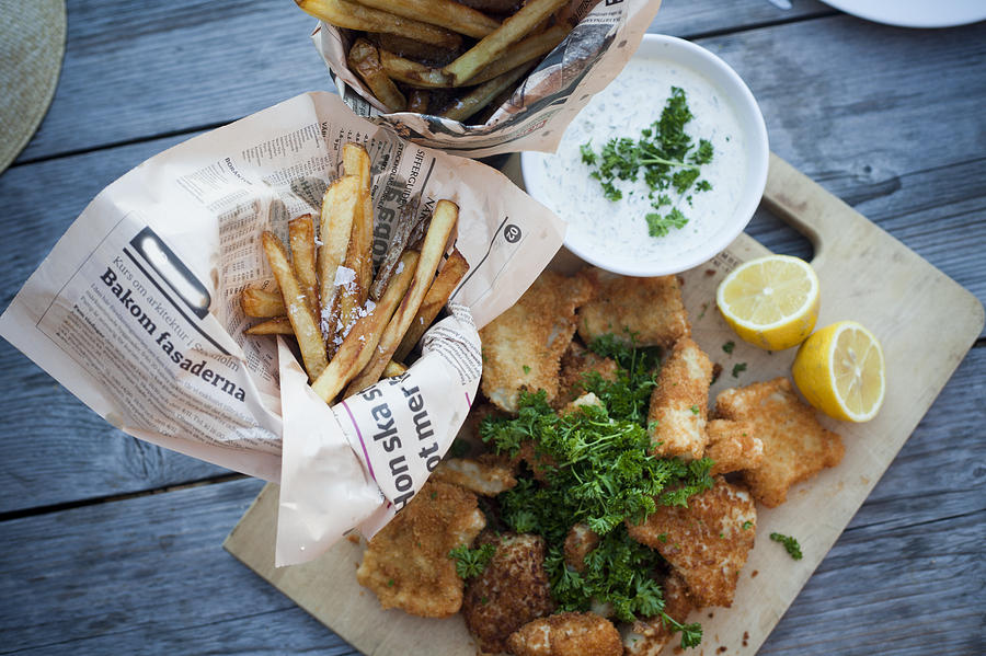 Fish and chips Photograph by Johner Images