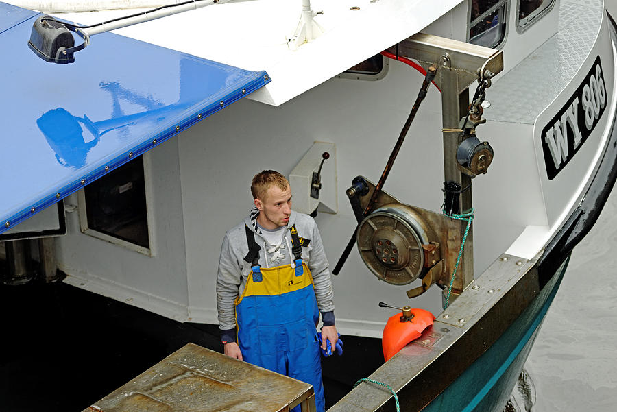 Fisherman Aboard The Olivia Rose - Whitby Photograph by Rod Johnson