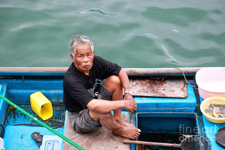 Fisherman and His Catch Photograph by Charline Xia