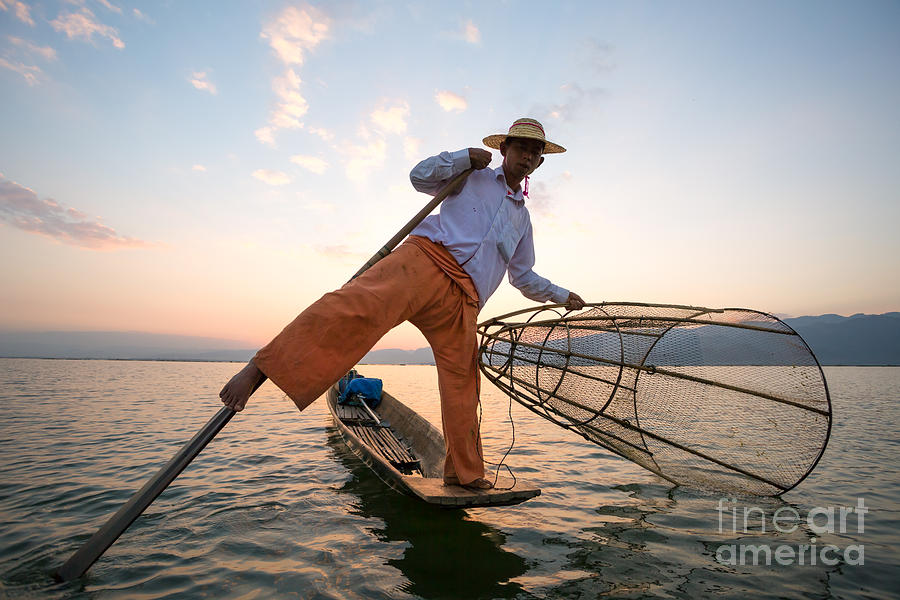 Fisherman at sunset - Inle lake - Myanmar Photograph by Matteo Colombo