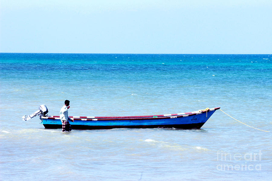 Boat Photograph - Fisherman in Socotra by Muneer Binwaber