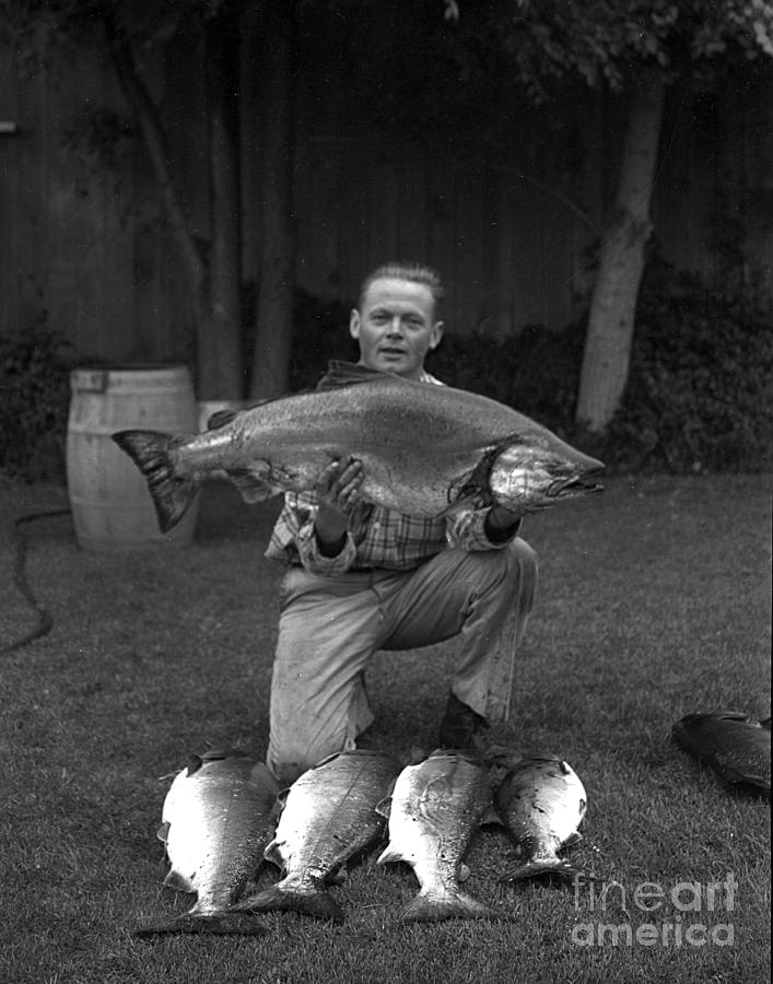 Salmon Photograph - Fisherman with his catch Salmon from Monterey Bay Circa 1955 by Monterey County Historical Society