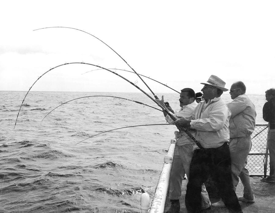 Fishermen Get Strikes Photograph by Underwood Archives - Pixels