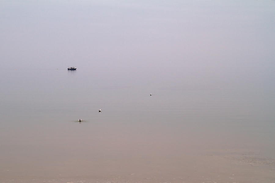 Fishermen in Early Fog Photograph by Chuck De La Rosa
