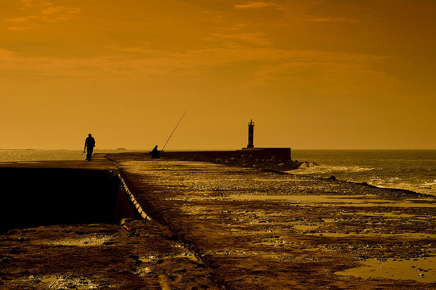 Fishermen on Lighthouse Photograph by Paulo Goncalves