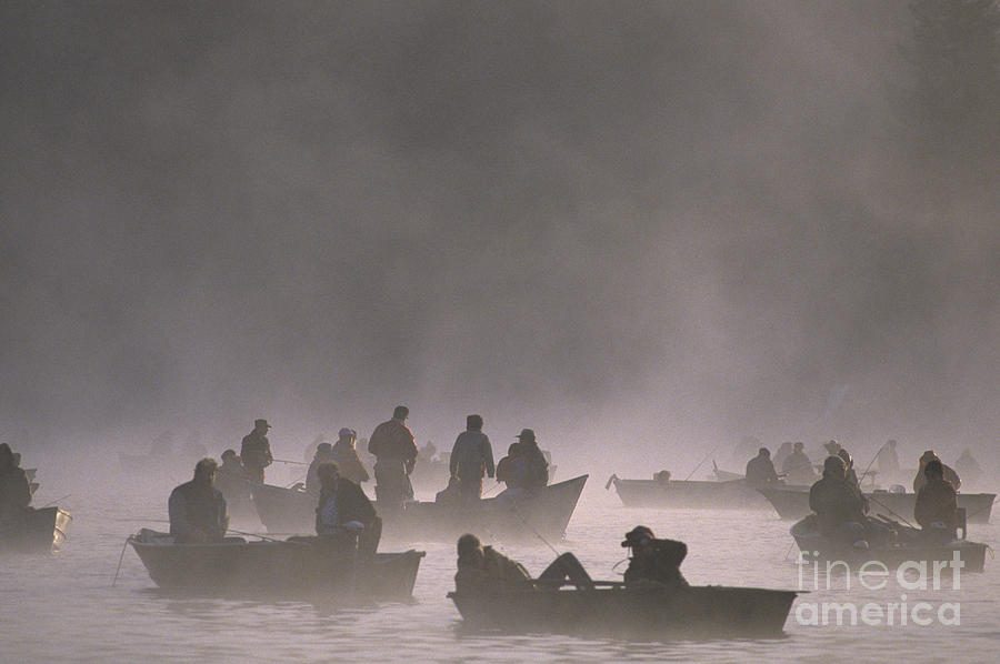 Fishermen on small lake Photograph by Jim Corwin