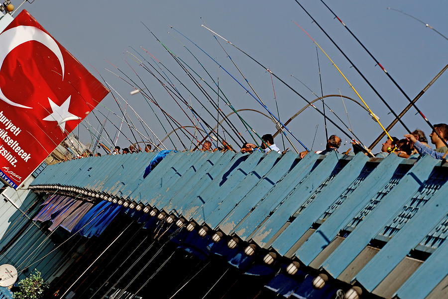 Fish Photograph - Fishermen on the Galata Bridge in Istanbul Turkey by Ronald Jansen