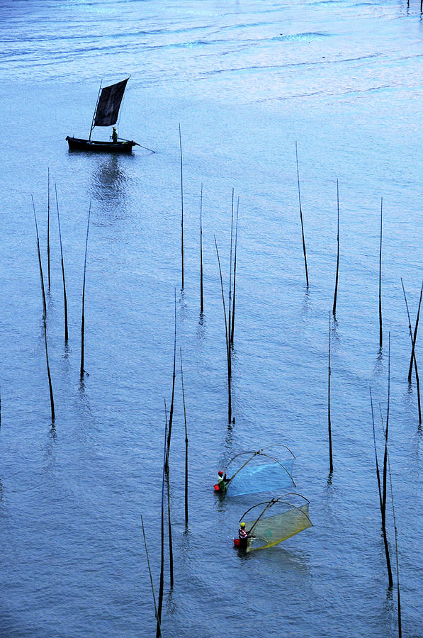 Fishermen Working In High-tide Mudflats Photograph by Melindachan Fishermen Working In High-tide Mudflats Photograph by Melindachan