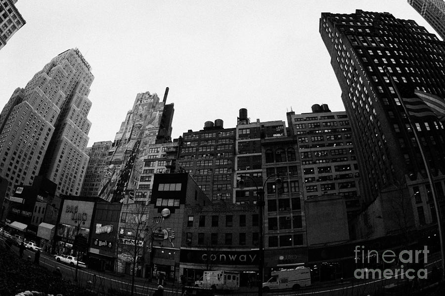 Winter Photograph - Fisheye View Of 34th Street From 1 Penn Plaza New York City Usa by Joe Fox