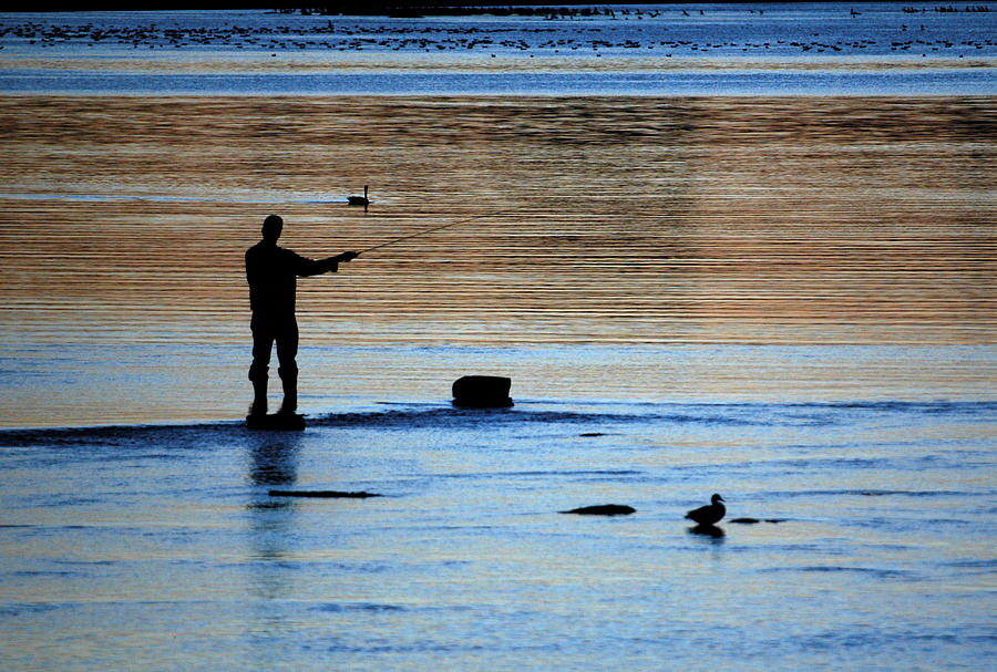 Fishing at Remic Rapids. Photograph by Rob Huntley