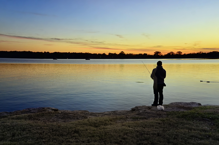 Fishing At Sunset Photograph