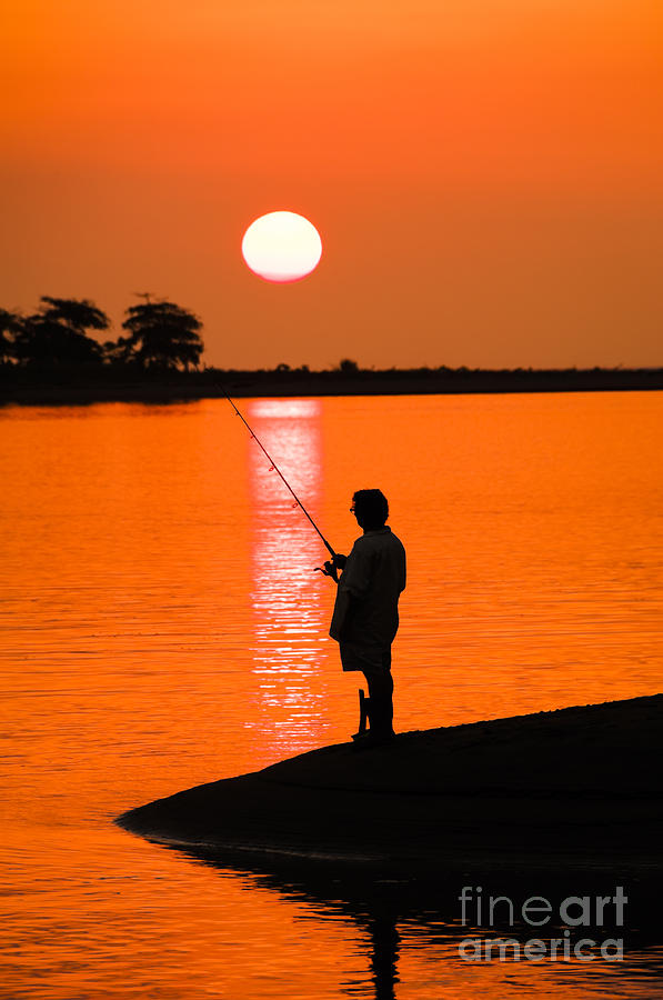 Fishing at the end of the day Photograph by Oscar Gutierrez