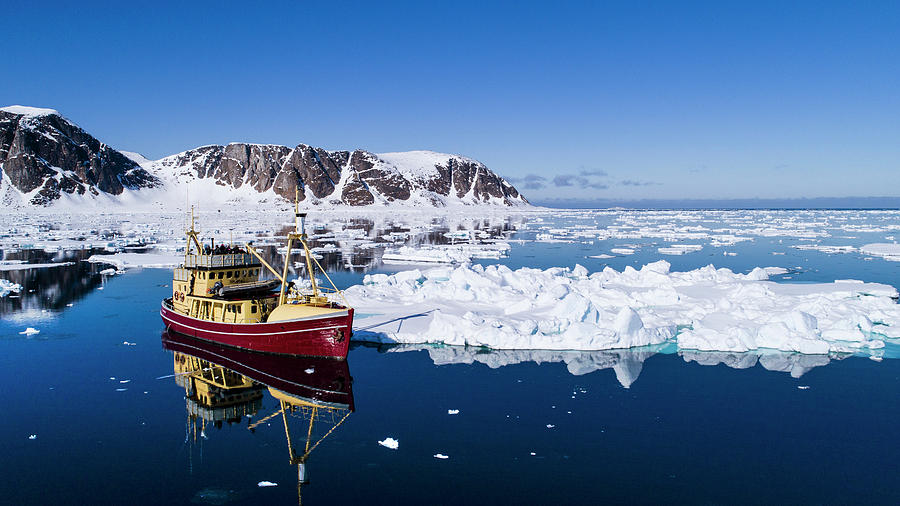 Fishing Boat In Arctic Sea Photograph by Raffi Maghdessian - Pixels