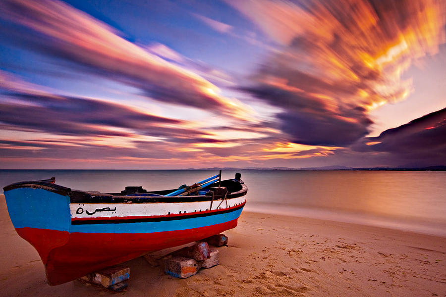 Sunset Photograph - Fishing Boat on a Beach at Sunset / Hammamet by Barry O Carroll