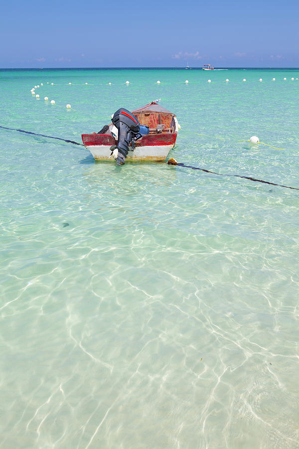 Fishing Boat On Idyllic Tropical Beach Photograph by Douglas Pearson