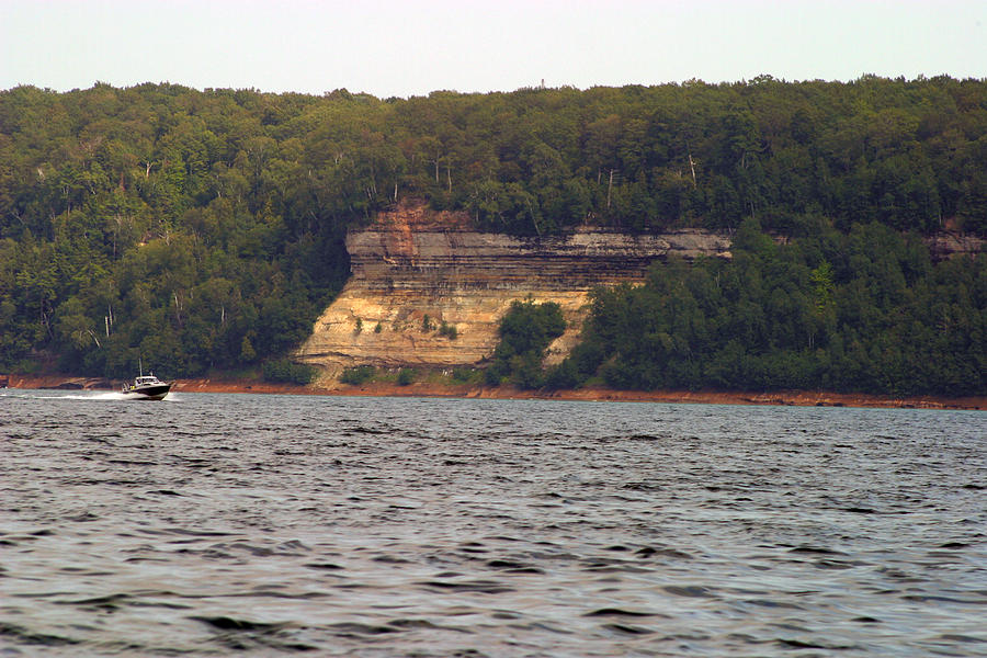Tree Photograph - Fishing boat Pictured Rocks by Kevin Snider