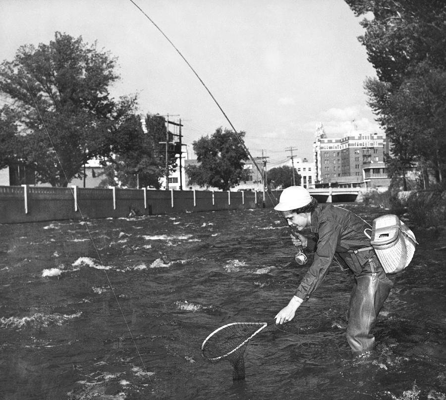 Fishing In The City Photograph by Underwood Archives