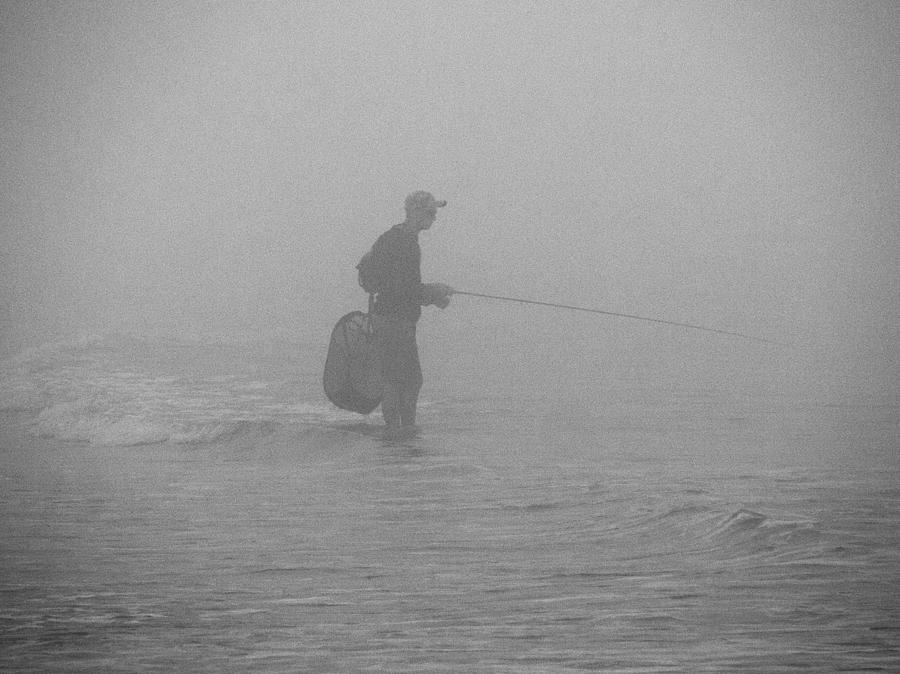 Fishing in the Surf Photograph by Paul Ross