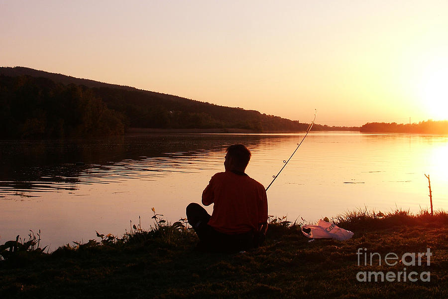 Fishing into the sunset Photograph by Joe Cashin