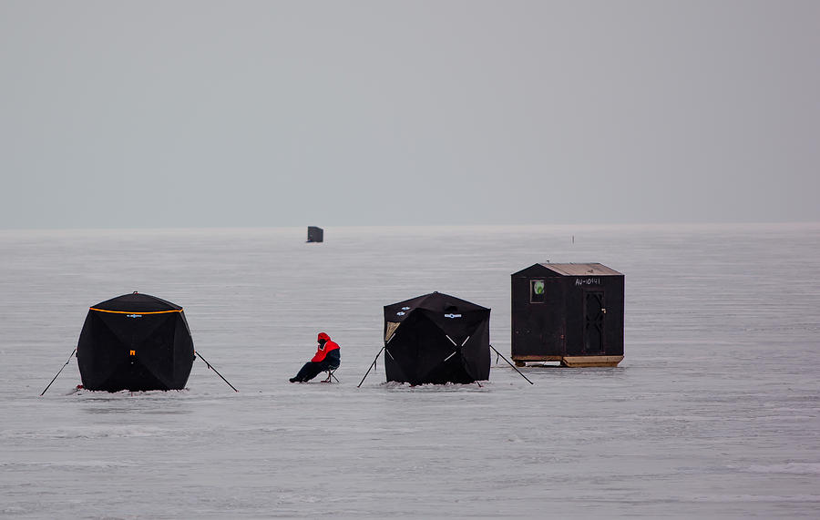 Fishing on Icy Lake Photograph by James Canning