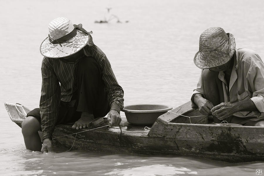 Fishing on Tonle Sap Photograph by John Meader