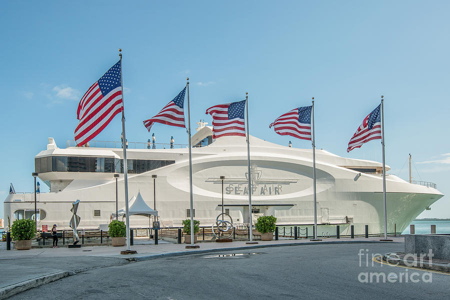 Flag Photograph - Five US Flags flying proudly in front of the megayacht Seafair - Miami - Florida by Ian Monk